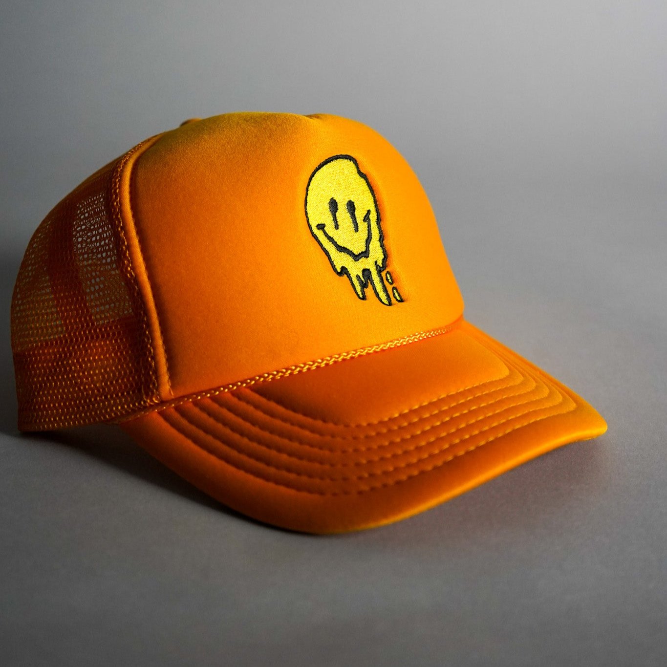 Melted Smiley Face Trucker Hat - Gold