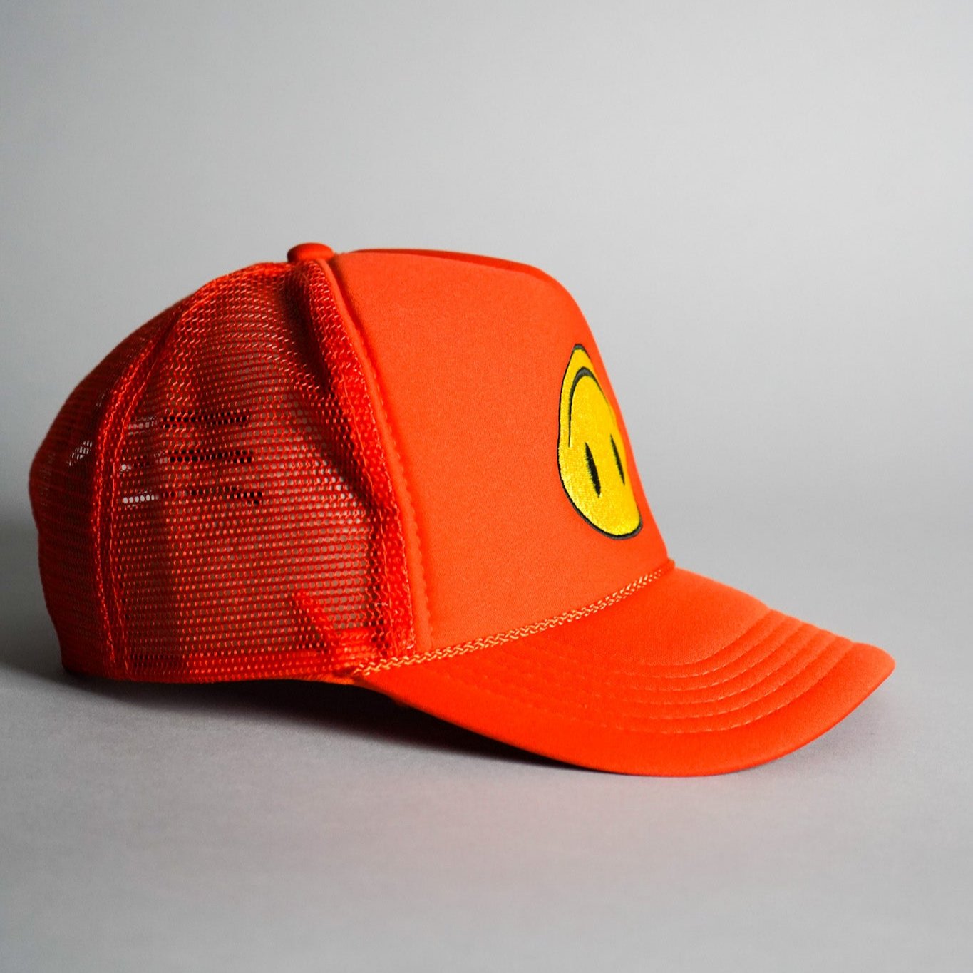 Upside Down Smiley Face Trucker Hat - Orange