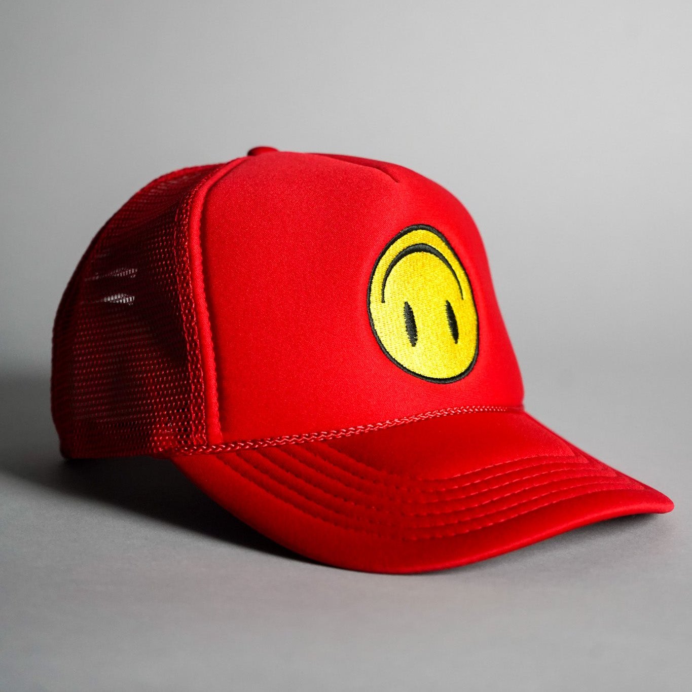 Upside Down Smiley Face Trucker Hat - Red