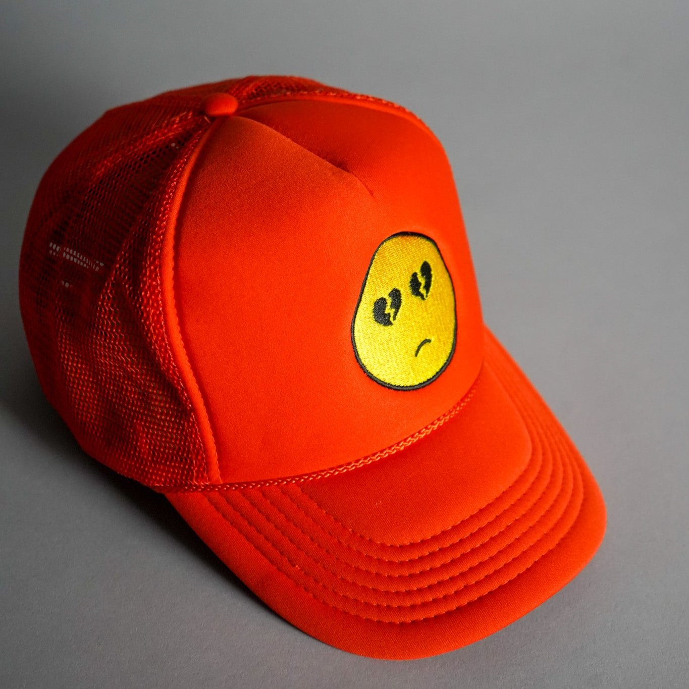 Broken Heart Eyes Trucker Hat - Orange