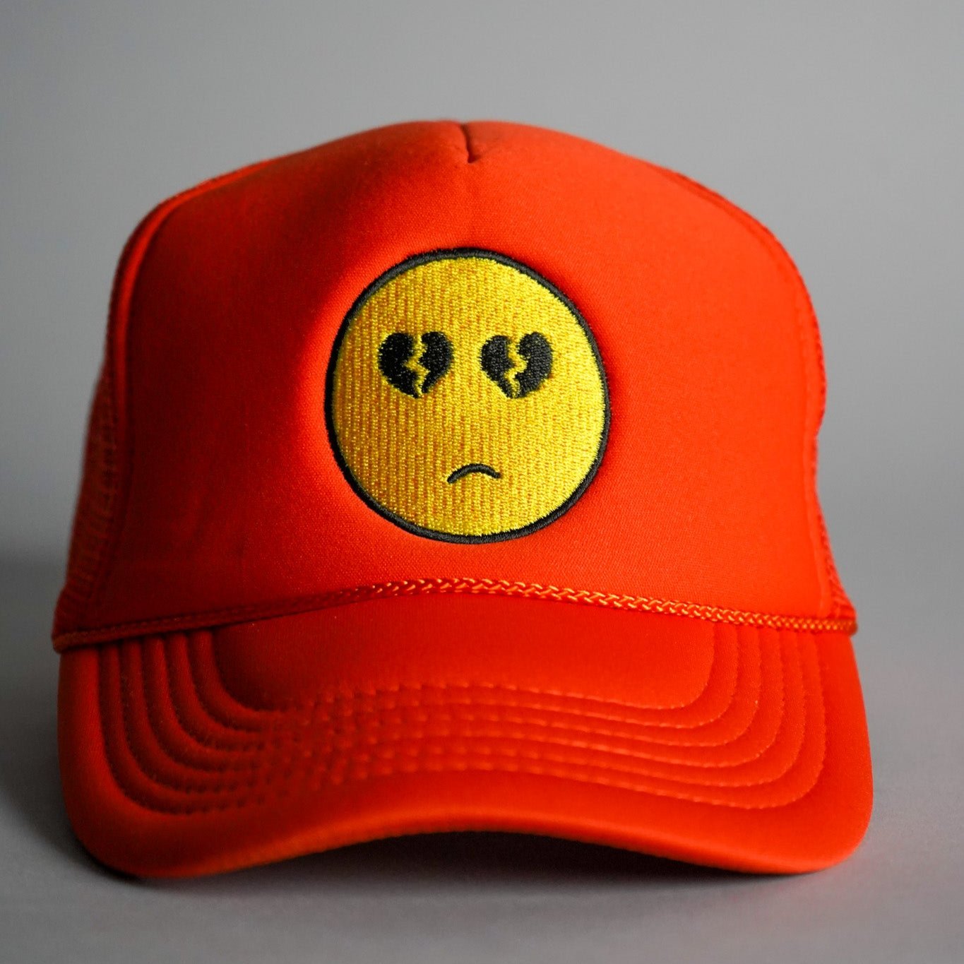 Broken Heart Eyes Trucker Hat - Orange