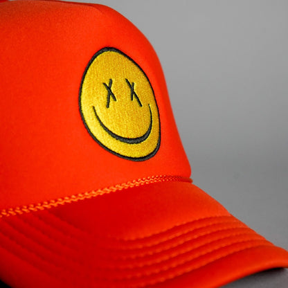 X Eyes Smiley Face Trucker Hat - Orange